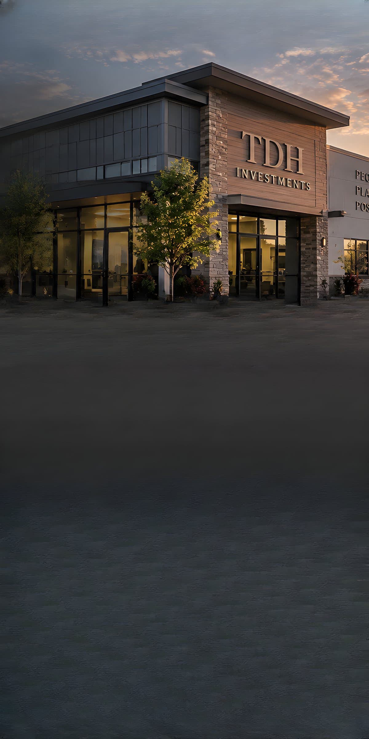 Illustration of a TDH Investments commercial building at sunset